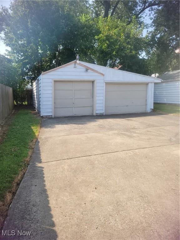 detached garage with fence