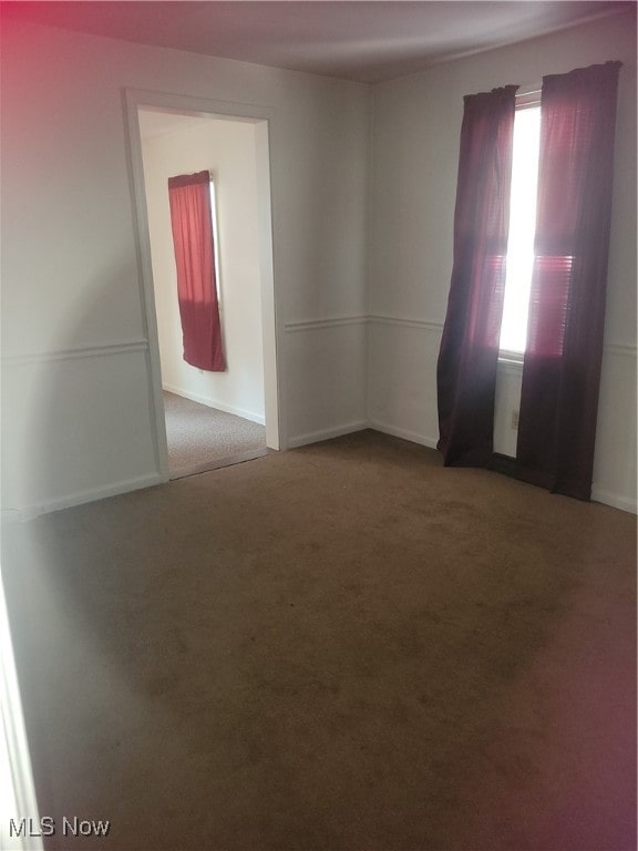 spare room with carpet flooring