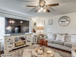 living room with ceiling fan