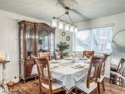 dining space featuring dark hardwood / wood-style floors