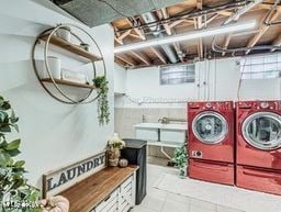 laundry room with washing machine and clothes dryer