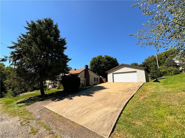 view of front facade with a front lawn and a garage