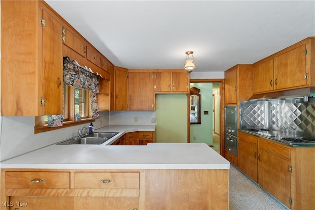 kitchen with kitchen peninsula and sink