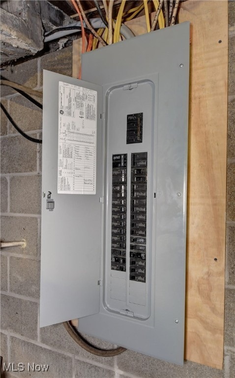 utility room featuring electric panel