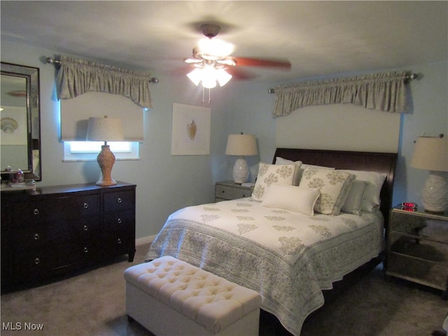 bedroom with ceiling fan and carpet floors