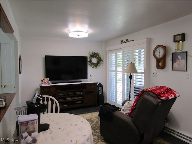 living room with a baseboard radiator