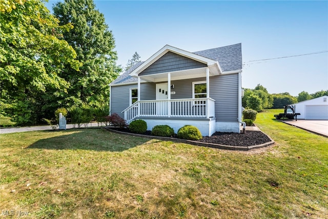 view of front of home featuring a porch and a front lawn