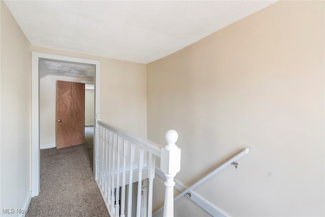 hallway featuring carpet flooring