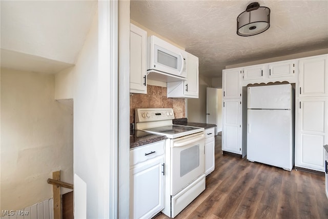 kitchen featuring white appliances, white cabinetry, dark wood-type flooring, tasteful backsplash, and a textured ceiling