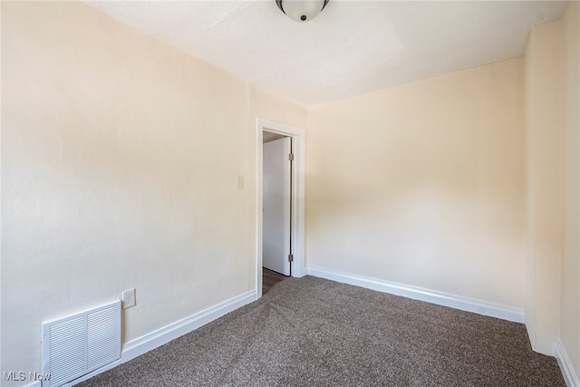 spare room with carpet floors