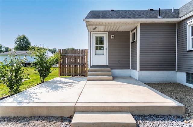 entrance to property featuring a patio area