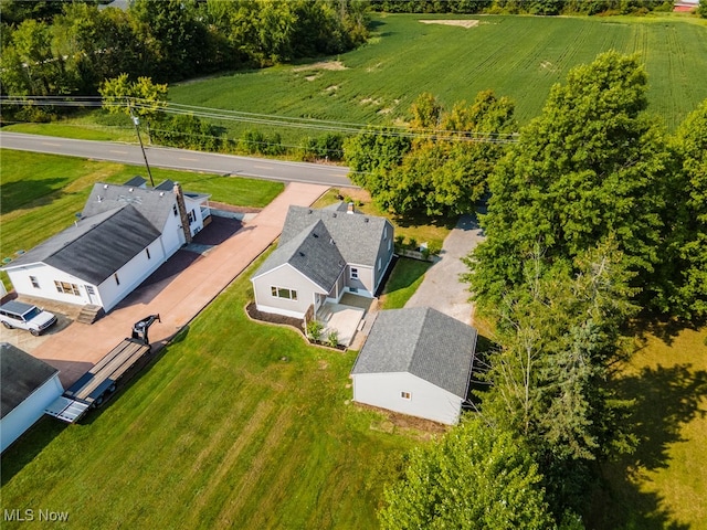 birds eye view of property with a rural view