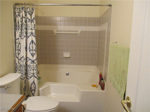 full bathroom with shower / bath combo, toilet, and vanity