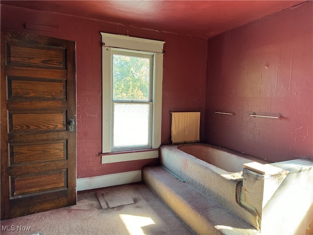 unfurnished bedroom with carpet flooring