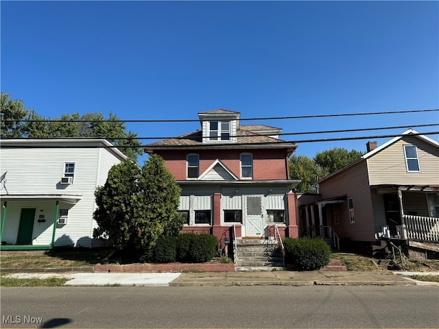 view of front of property with cooling unit