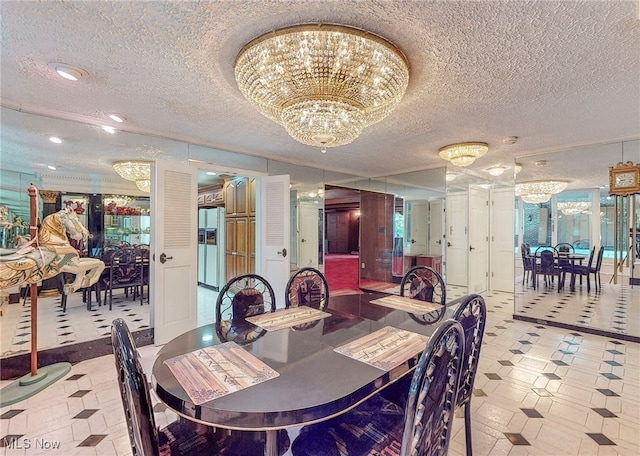 dining area with a notable chandelier and a textured ceiling