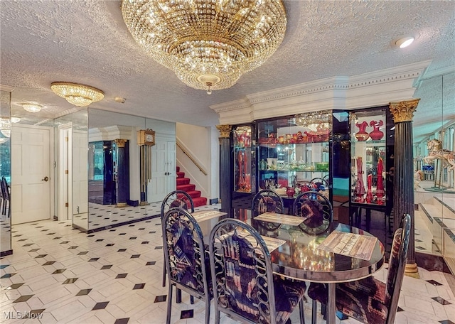 dining room featuring a textured ceiling and a notable chandelier