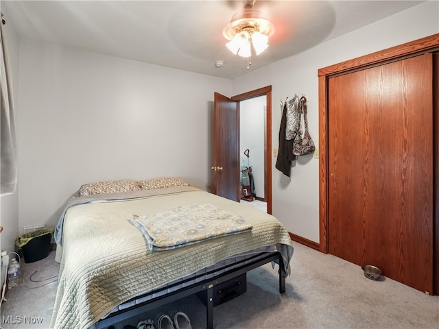 bedroom with carpet and ceiling fan