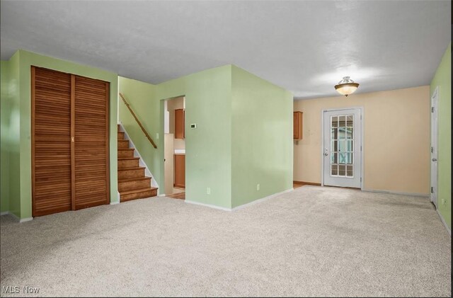 empty room featuring carpet flooring