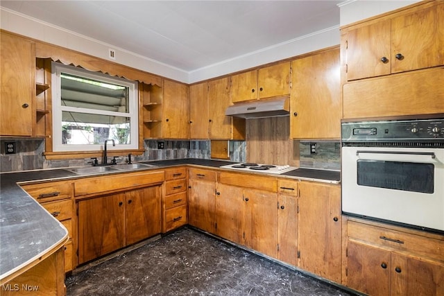 kitchen featuring white appliances, under cabinet range hood, a sink, and open shelves