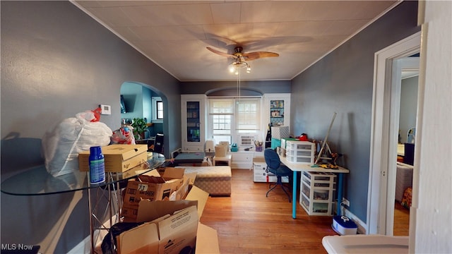 interior space featuring hardwood / wood-style floors and ceiling fan