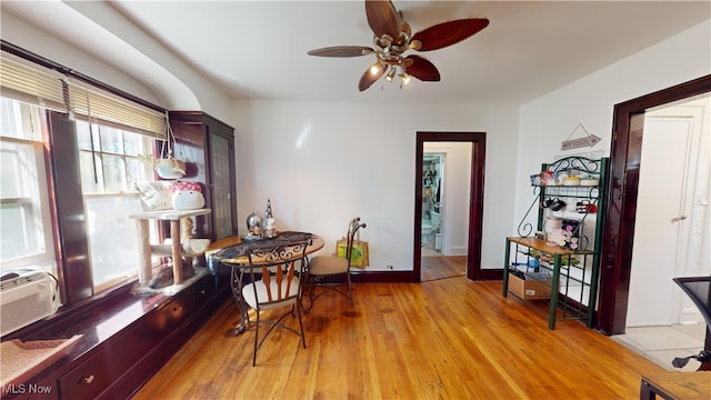 interior space with ceiling fan and light hardwood / wood-style floors