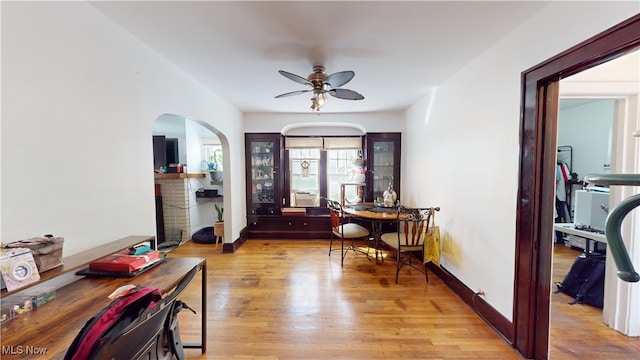 interior space with light wood-type flooring and ceiling fan