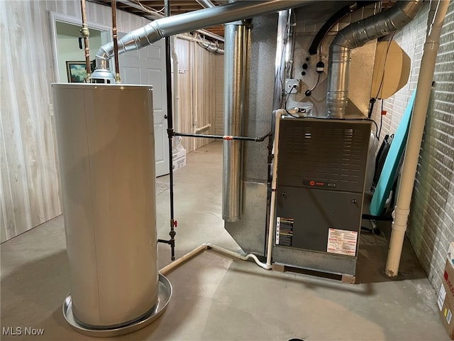 utility room featuring water heater