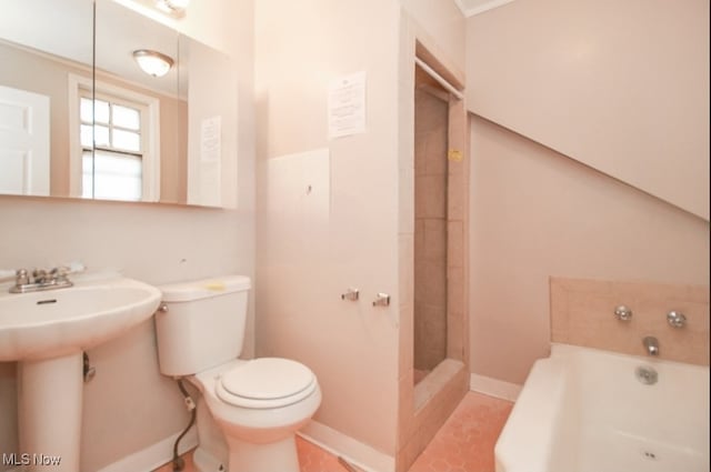 full bathroom featuring plus walk in shower, tile patterned flooring, toilet, and sink