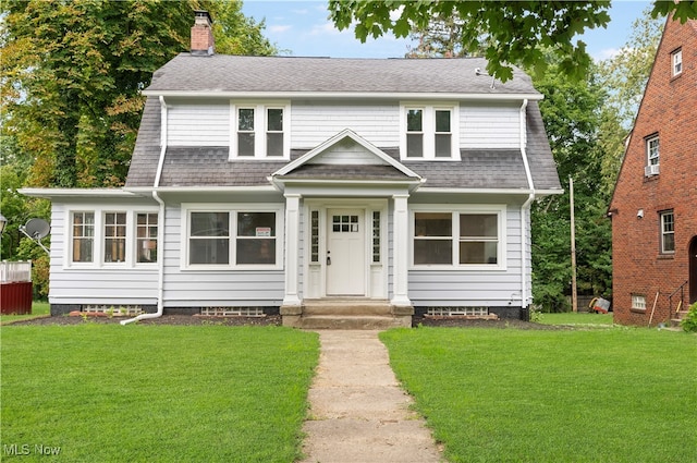 view of front of house with a front lawn