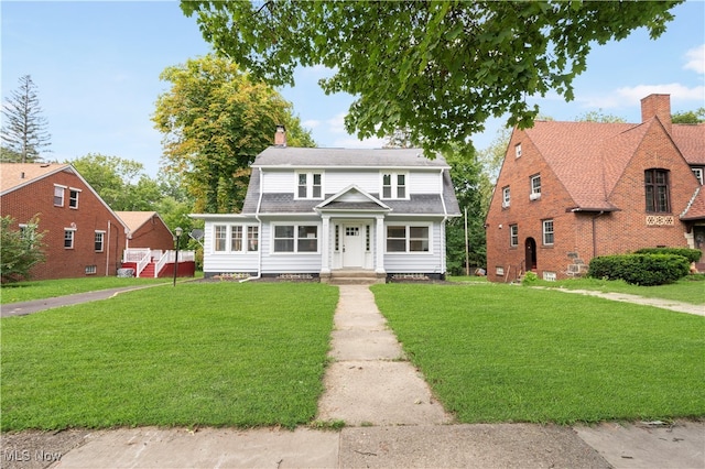 view of front facade with a front yard