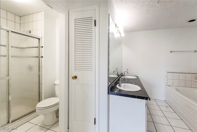 full bathroom with a textured ceiling, vanity, toilet, and plus walk in shower