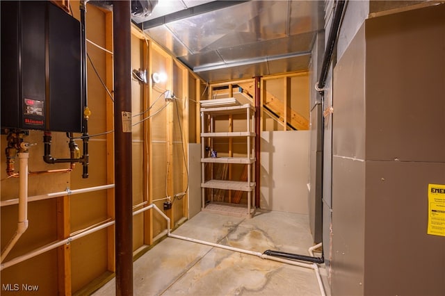 basement with heating unit and water heater