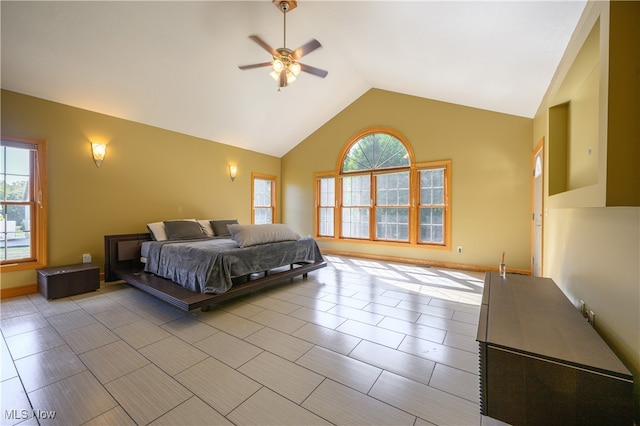 bedroom with lofted ceiling and ceiling fan