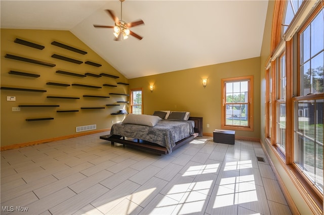 bedroom featuring high vaulted ceiling and ceiling fan