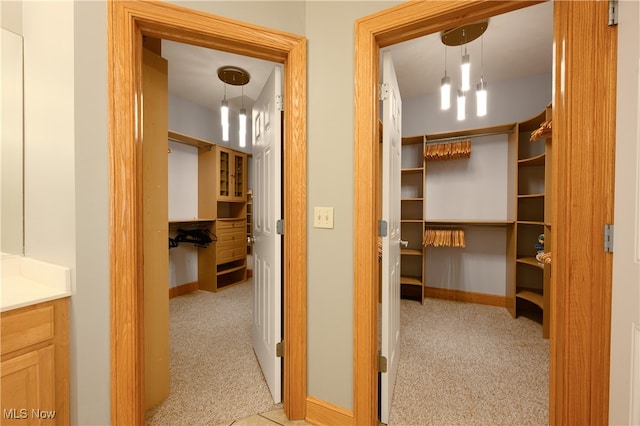 hallway with light carpet