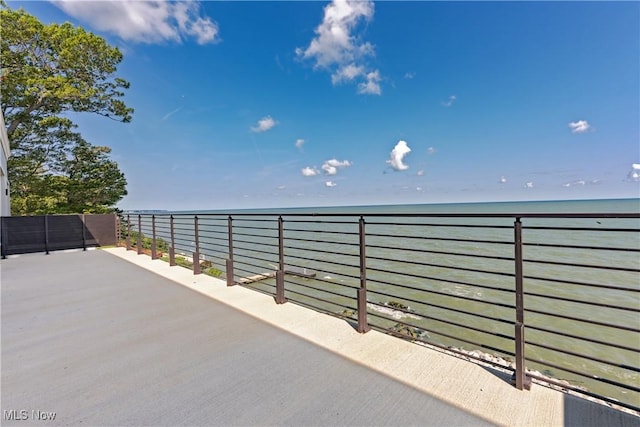 view of patio / terrace featuring a water view