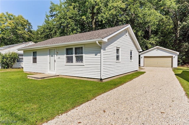 view of home's exterior with an outbuilding, a yard, and a garage