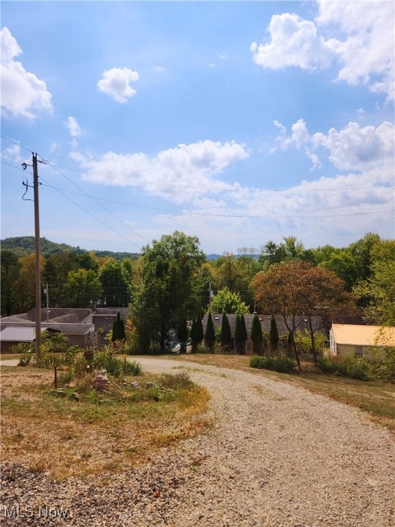 view of road with a rural view