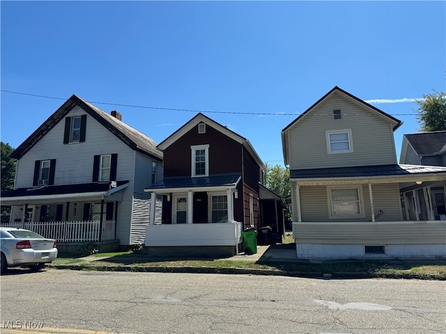 view of front of property featuring covered porch