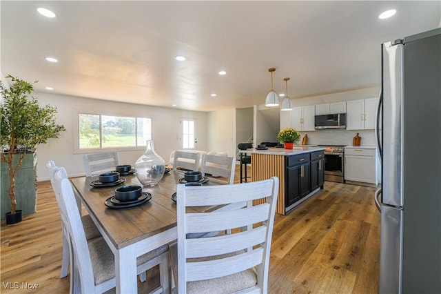 dining area featuring light hardwood / wood-style floors