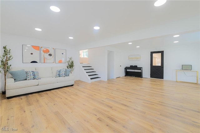 unfurnished living room featuring light wood-type flooring