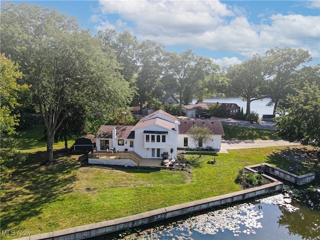 exterior space with a water view