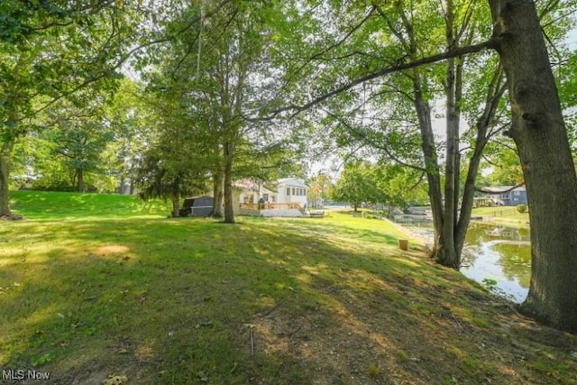 view of yard with a water view