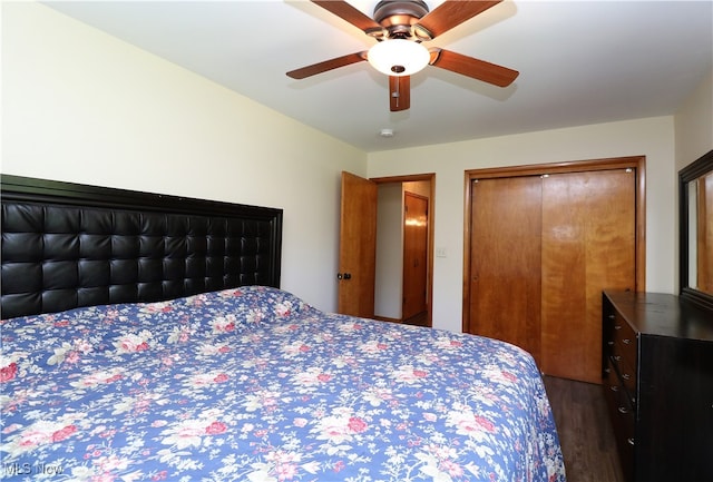 bedroom featuring dark wood-type flooring and ceiling fan