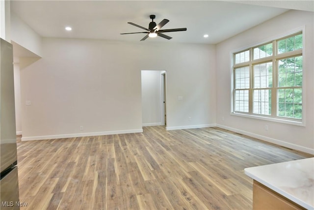 interior space featuring ceiling fan and wood-type flooring