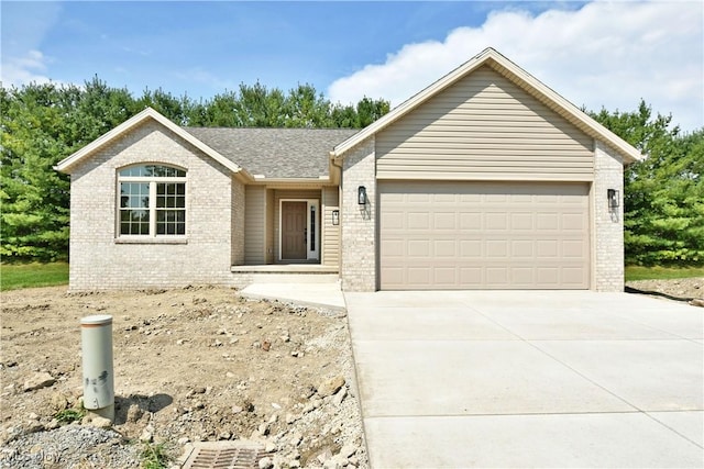 ranch-style house featuring a garage