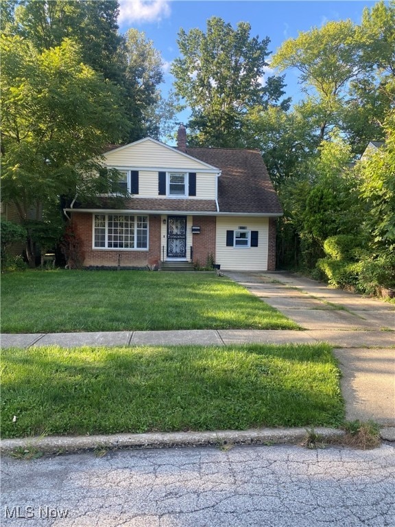 view of front of home with a front yard