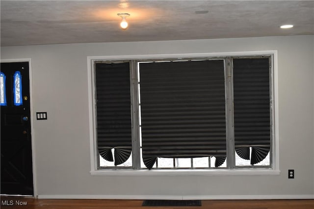 interior space with hardwood / wood-style floors