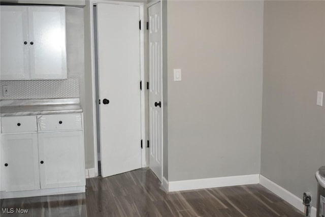 interior space with dark wood-type flooring